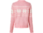 Pink sweater with white snowflake pattern, Christmas style.
