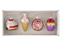 Box with four dessert-themed Christmas ornaments: a cake slice, an ice cream cone, a donut, and a cupcake.