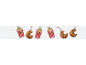 Popcorn and croissant Christmas ornaments on a white wooden background.