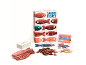 Board game with cards, tokens, and fish figures on a white background.