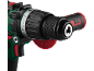 Front part of a drill with chuck and torque adjustment ring.