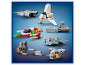 Six small, colorful building block models of spacecraft on a blue background.