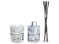 Christmas-themed fragrance diffuser and tealight holder with a snowy house design.