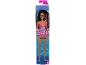 Doll in a swimsuit with a floral print, in pool-themed packaging.