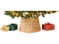 Wicker Christmas tree skirt with lights and wrapped presents.