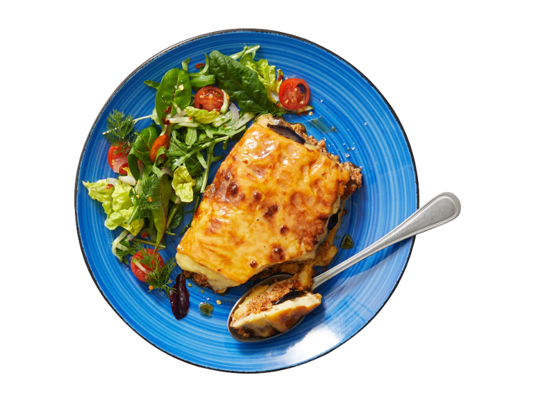 Moussaka with fresh salad on a blue plate.