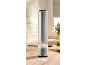 Stainless steel electric salt grinder on a kitchen counter.