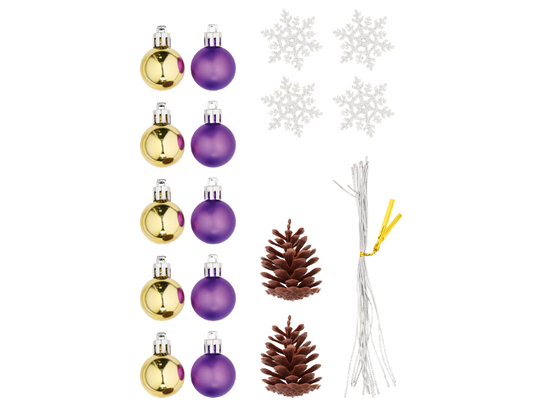 Christmas decorations: gold and purple baubles, snowflakes, pine cones, and silver strings.