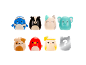 Eight toy figures of animals and drinks, including a clownfish, a skunk, and a puppy.
