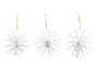 Three white paper star-shaped Christmas decorations hanging from a golden string.