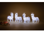 Four illuminated reindeer and Christmas decorations.