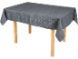 Grey tablecloth with floral pattern on a wooden table