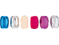 Assorted colored gift ribbons: blue, silver, beige, fuchsia, purple, and holographic.