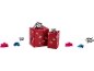 Two red Christmas gifts with snowflakes and silver bows, with additional colorful bows.