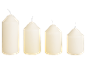 Four cream-colored wax candles of different sizes, with white wicks, on a black background.