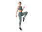 Woman in sports bra and leggings in a running pose.