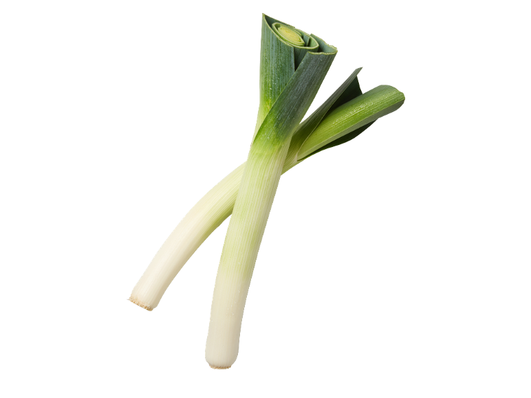 Two fresh leeks with green leaves and white stalks, crossed on a black background.