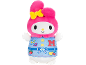 Pink plush toy with a blue apron and decorations.