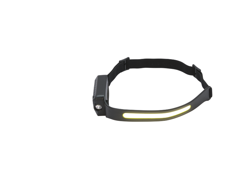 Black headlamp with yellow LED light turned on.