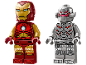 Two toy figures, one red and gold, and one silver with red details.