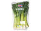 Fresh leeks in transparent packaging with a British flag.