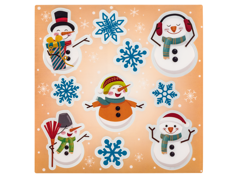 Christmas stickers featuring snowmen and snowflakes on an orange background.