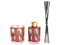 Christmas-themed candle and aroma diffuser featuring a red house and nutcracker soldier.