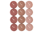 Twelve brown and pink tea lights on a black background.