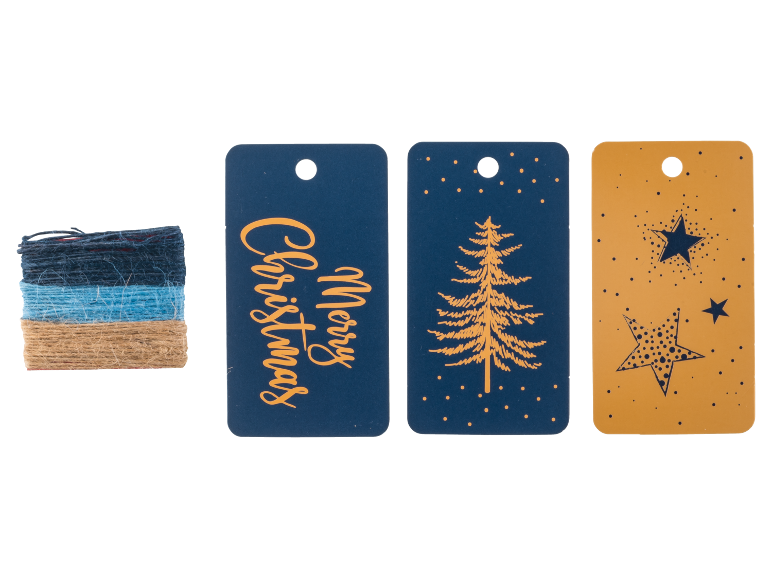 Blue and yellow Christmas gift tags with festive designs and a roll of twine.