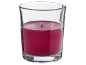 Red candle in glass container