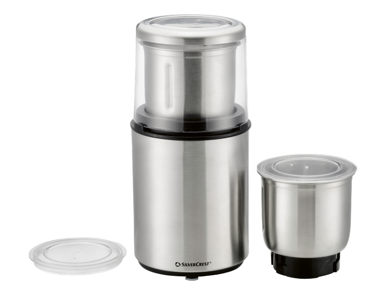 Stainless steel coffee and spice grinder with two containers and transparent lids.