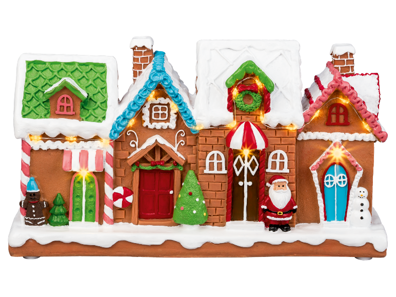 Light-up gingerbread Christmas house with Santa and snowman figures.
