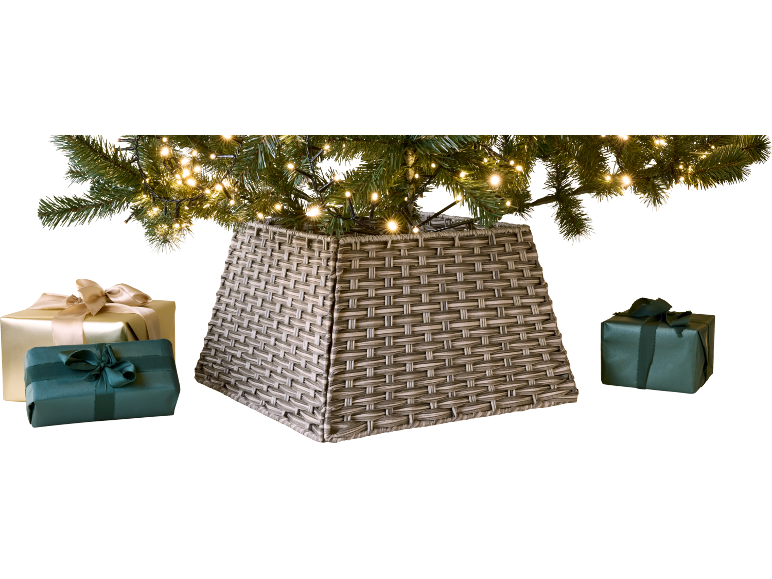 Wicker basket base for an illuminated Christmas tree with wrapped gifts.