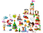 Toy building block set with Christmas-themed figures and constructions, including a castle and Christmas tree.
