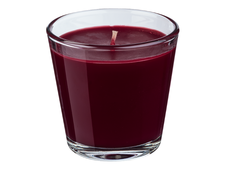 Red scented candle in a glass jar