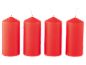 Four red candles with white wicks on a black background.