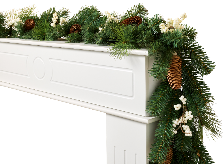 Christmas garland with pinecones and white berries on a white fireplace mantel.