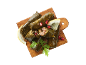 Dolmades with lemon, pomegranate, and parsley on a wooden board.