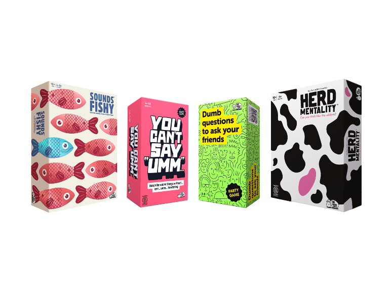 Four different colorful party game boxes lined up in a row.