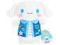 White plush toy wearing a blue vest with pink cheeks.