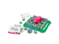 Board game with question cards, tokens, and a pink cow figure.