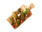 Stuffed vine leaves (dolmades) with fresh salad and flatbread on a wooden board.