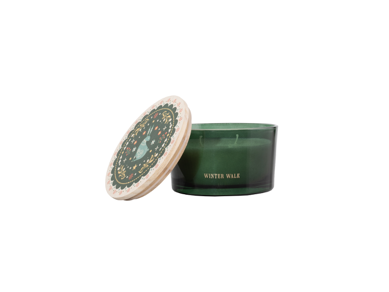 Winter Walk scented candle in a green glass jar with a wooden lid