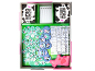 Board game in a box with cow-themed cards, tokens, and a pink cow figurine.