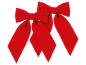 Two red velvet bows on a black background.