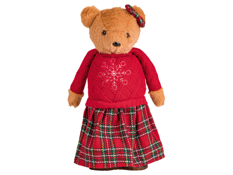 Teddy bear with red snowflake sweater and plaid skirt