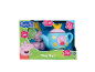 Peppa Pig tea set with teapot, cups, plates, and biscuits, playing melodies.