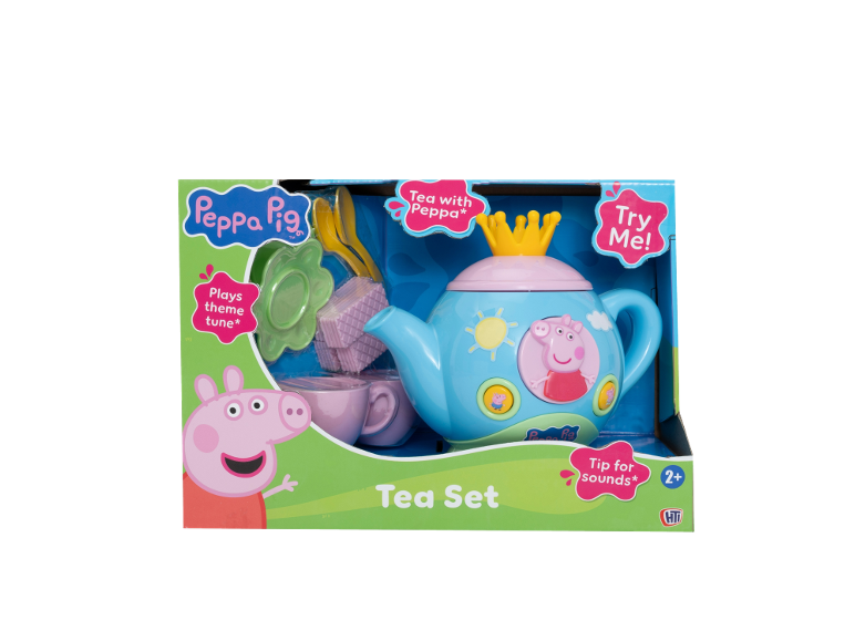 Peppa Pig tea set with teapot, cups, plates, and biscuits, playing melodies.