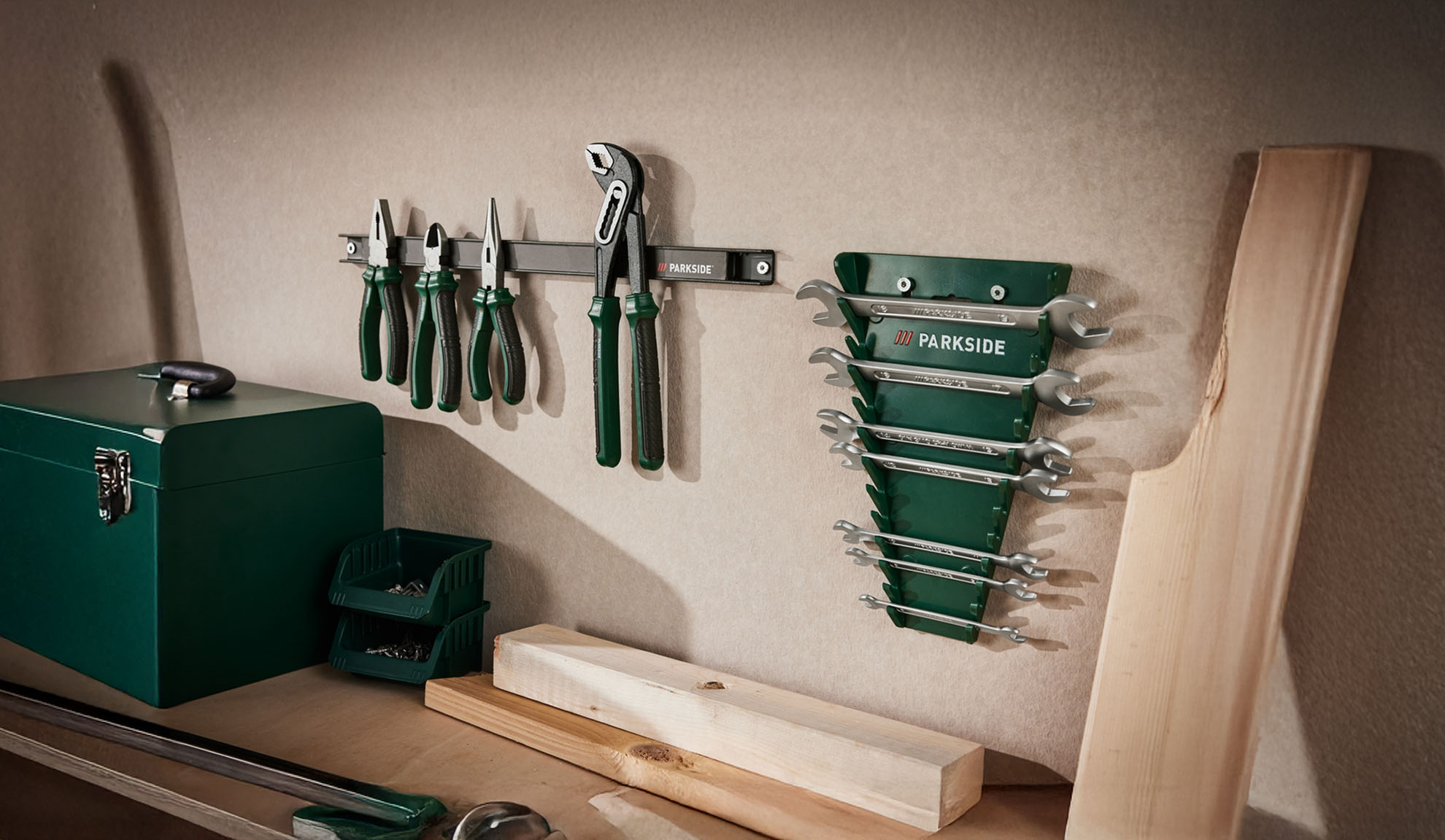 Parkside workshop organization: pliers, wrenches, and toolbox.