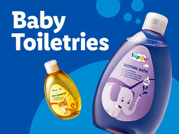 Lupilu baby toiletries, including Bedtime Bath and Baby Shampoo, on a blue background.
